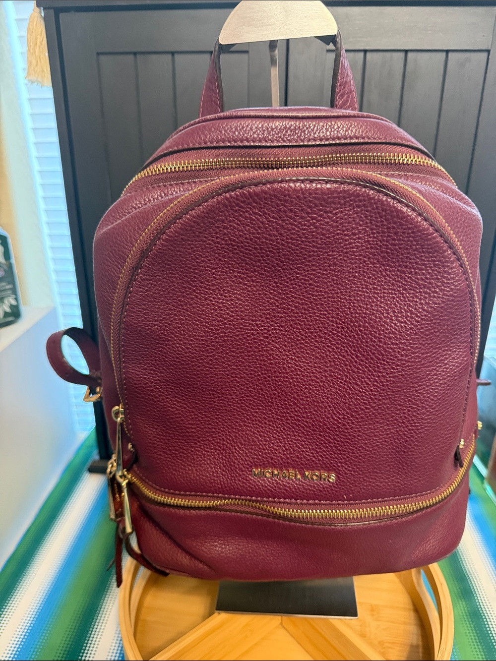 Michael Kors Wine Pebbled Leather Mini Backpack with Gold Hardware